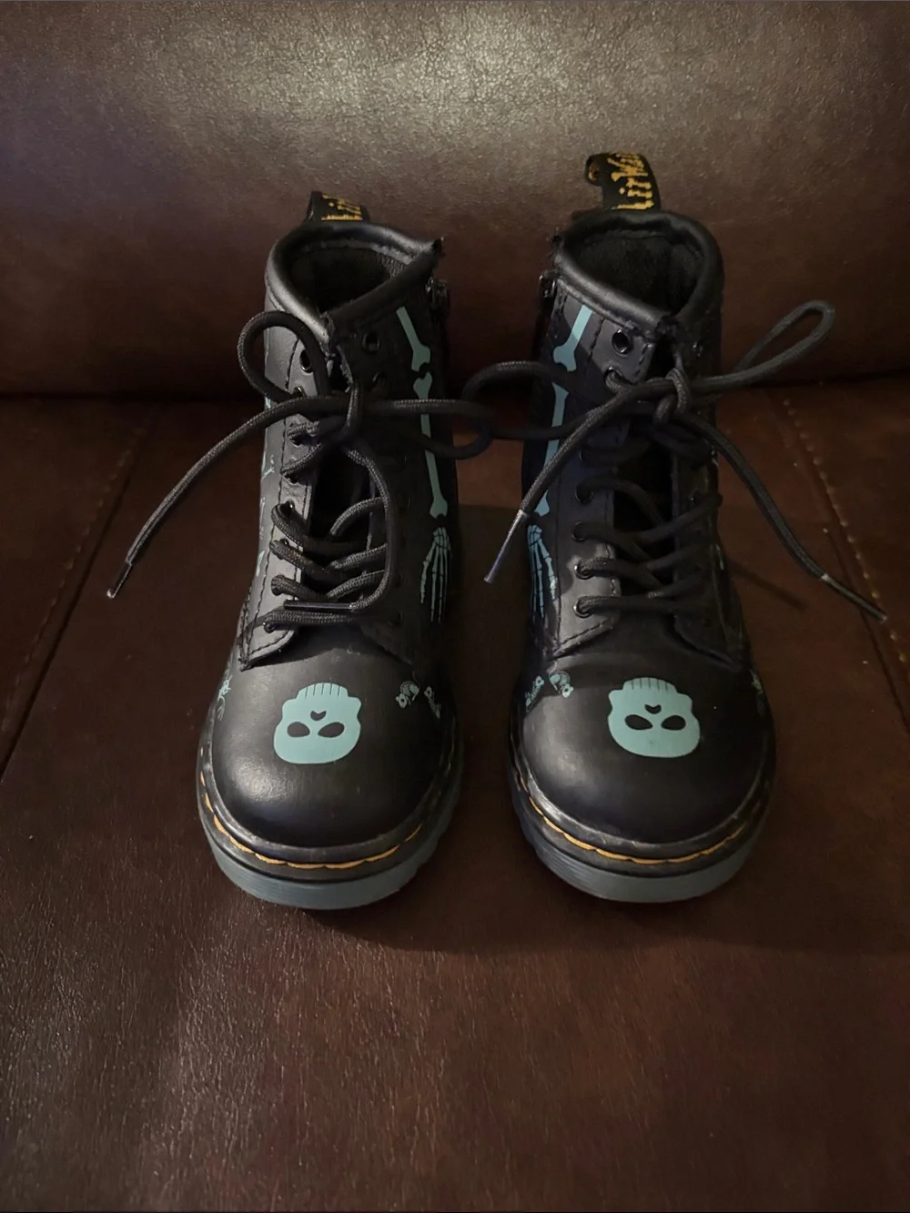 Dr. Martens Kids Black Boots with Teal Skull Accents